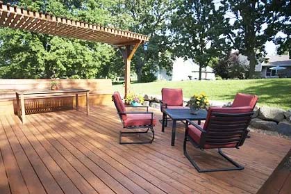Decking area with 4 red cushioned seats